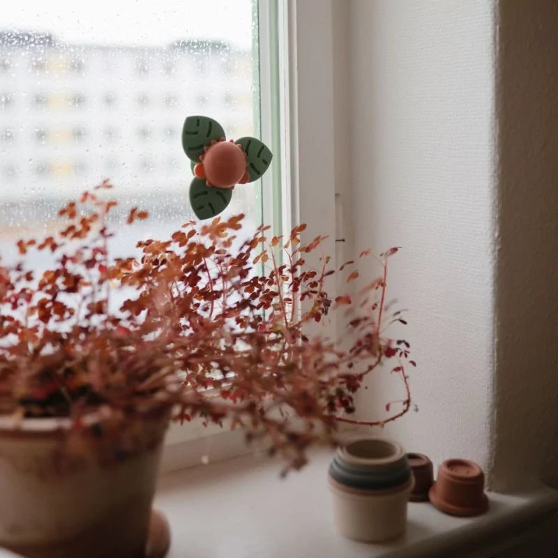 Mushie | Suction Spinner Dino